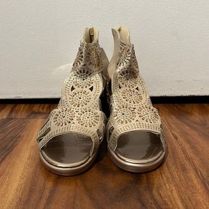 Hello this is my first listing. So I’ve listed some gold colored heels with gems